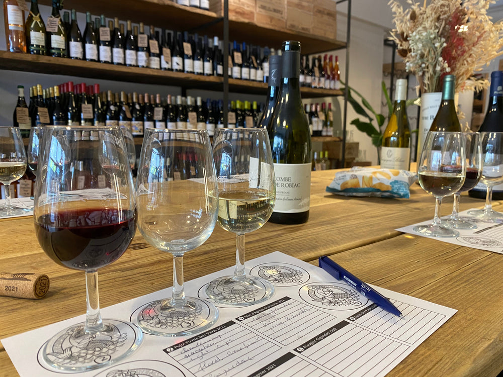 wooden table with wines glasses